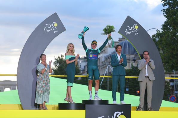 Tadej Pogačar, winner of the 113th Tour de France, receives crystal trophy created by Škoda Design